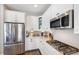 Well-equipped kitchen with stainless steel appliances, ample cabinet space, and modern fixtures at 3991 Mellon Dr, Odessa, FL 33556