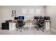 Bright office space with dual workstations, modern computers, and comfortable seating at 3991 Mellon Dr, Odessa, FL 33556