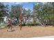 A fun playground with climbing structures, nets, and slides offers children a place to play and be active at 3991 Mellon Dr, Odessa, FL 33556