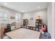 Spacious playroom with natural light, neutral walls, hardwood floors, and toys at 3991 Mellon Dr, Odessa, FL 33556