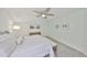 Bright bedroom with bench, ceiling fan, and comfortable layout at 413 Islebay Dr, Apollo Beach, FL 33572