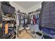 Spacious walk-in closet with ample storage and organization, featuring shelving and baskets at 413 Islebay Dr, Apollo Beach, FL 33572