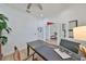 Functional home office featuring a desk, natural light, and French doors at 413 Islebay Dr, Apollo Beach, FL 33572