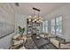 Comfortable sitting area with modern decor, stylish lighting, and a decorative rug at 413 Islebay Dr, Apollo Beach, FL 33572