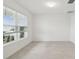 Large bonus room with tile floor, large window and lots of natural light at 4255 Big Sky Dr, Spring Hill, FL 34604