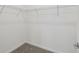 Walk-in closet with carpeted floor and wire shelving for ample storage at 4255 Big Sky Dr, Spring Hill, FL 34604