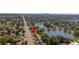 A beautiful house, located near a lake, with mature trees and surrounded by a vibrant neighborhood at 4322 22Nd N Ave, St Petersburg, FL 33713