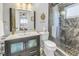 Updated bathroom featuring a modern vanity, tiled shower with glass door, and neutral color palette at 4322 22Nd N Ave, St Petersburg, FL 33713