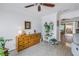 Spacious living room with terrazzo floors, archways, and access to kitchen and dining areas at 4322 22Nd N Ave, St Petersburg, FL 33713