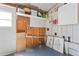 Utility room showing shelving with storage and unfinished drywall at 4851 W Gandy Blvd # B7L9, Tampa, FL 33611