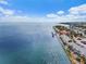 Captivating aerial view of beachfront condos with private docks, providing direct access to open waters at 4966 Coquina Key Se Dr # 4966, St Petersburg, FL 33705