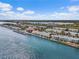 Panoramic aerial shot of waterfront condos with docks, offering serene water views and coastal charm at 4966 Coquina Key Se Dr # 4966, St Petersburg, FL 33705