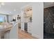 This living area features a bar area, open floor plan, and stylish finishes at 4966 Coquina Key Se Dr # 4966, St Petersburg, FL 33705