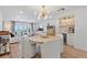 Charming open floor plan with a bar area, ocean views, and stylish furniture at 4966 Coquina Key Se Dr # 4966, St Petersburg, FL 33705