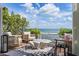 The outdoor patio provides stunning ocean views and stylish seating arrangements for guests at 4966 Coquina Key Se Dr # 4966, St Petersburg, FL 33705