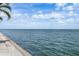 Gorgeous ocean view showing blue skies, white puffy clouds, and calm waters at 4966 Coquina Key Se Dr # 4966, St Petersburg, FL 33705