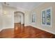 Spacious living room boasting hardwood floors and elegant architectural details at 5321 Fishersound Ln, Apollo Beach, FL 33572