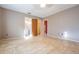 Spacious bedroom featuring tile floors and access to an ensuite bathroom and closet at 5419 Cyril Dr, Dade City, FL 33523