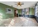 Well-lit sun room with ample windows and tile flooring at 5419 Cyril Dr, Dade City, FL 33523