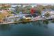 Waterfront home with boat lift, dock, and beautiful backyard deck at 56 Sandpiper Rd, Tampa, FL 33609