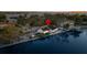 Waterfront property featuring a boat dock and convenient canal access at 56 Sandpiper Rd, Tampa, FL 33609