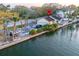 Waterfront property with boat, two-car garage, and canal access enhancing the outdoor lifestyle and convenience at 56 Sandpiper Rd, Tampa, FL 33609