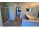 Bathroom featuring a glass shower, double sinks, and an open archway offering a glimpse into the Primary bedroom at 6283 Lorraine Ln, Spring Hill, FL 34608