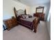 Primary bedroom showcases a stylish bed frame and matching wooden furniture set at 6283 Lorraine Ln, Spring Hill, FL 34608