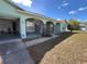 Charming home featuring stone accents, arched entryways, attached garage, and well-maintained landscaping at 6283 Lorraine Ln, Spring Hill, FL 34608