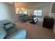Open living room offering comfortable seating, natural light, and a relaxing atmosphere at 6283 Lorraine Ln, Spring Hill, FL 34608