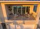 Exterior view of the house highlighting the balcony with seating and views at 6976 S Shore S Dr, St Petersburg, FL 33707