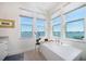 This spacious bathroom has a luxurious soaking tub with water views at 6976 S Shore S Dr, St Petersburg, FL 33707