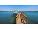 View of the boat dock featuring a boat lift at 6976 S Shore S Dr, St Petersburg, FL 33707
