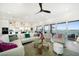Bright and airy living room with modern decor and expansive views of the bay at 6976 S Shore S Dr, St Petersburg, FL 33707