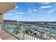 Enjoy the serene view of the water and surrounding area from the balcony of this waterfront condo at 1 Key Capri # 604W, Treasure Island, FL 33706