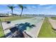 Outdoor shuffleboard court with benches near green spaces, marina and waterfront views at 1 Key Capri # 604W, Treasure Island, FL 33706