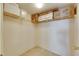 Spacious walk-in closet with shelving at 1 Key Capri # 604W, Treasure Island, FL 33706