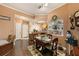 Bright dining area featuring hardwood floors and decorative shelving accents at 10017 Courtney Palms Blvd # 301, Tampa, FL 33619