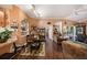 Open floor plan with a clear view of the dining area and sunroom from the living space at 10017 Courtney Palms Blvd # 301, Tampa, FL 33619