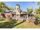 Exterior shot of the house with well-kept lawn at 102 Old Mill Pond Rd, Palm Harbor, FL 34683
