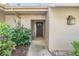 Inviting front entrance with a decorative door and stone accents at 102 Old Mill Pond Rd, Palm Harbor, FL 34683