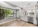 Bright eat-in kitchen with a large window and stainless steel appliances at 102 Old Mill Pond Rd, Palm Harbor, FL 34683