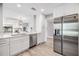 Contemporary kitchen featuring quartz countertops and stainless steel appliances at 102 Old Mill Pond Rd, Palm Harbor, FL 34683
