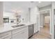 Well-appointed kitchen with quartz countertops and stainless steel appliances at 102 Old Mill Pond Rd, Palm Harbor, FL 34683