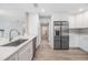 Stylish kitchen equipped with stainless appliances and quartz countertops at 102 Old Mill Pond Rd, Palm Harbor, FL 34683