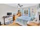 Inviting bedroom featuring ample light from the window and computer station with desk and storage at 11430 94Th St, Largo, FL 33773