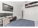 Bedroom featuring a ceiling fan, a work space, and a large closet at 12227 Glencliff Cir, Tampa, FL 33626