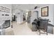 Spacious dining area with modern furnishings, easy access to kitchen, and cozy fireplace at 12227 Glencliff Cir, Tampa, FL 33626