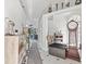 Elegant foyer with soaring ceilings, neutral color palette, and stylish decor creates a welcoming and sophisticated ambiance at 12227 Glencliff Cir, Tampa, FL 33626