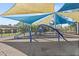 Community playground area with covered seating at 12227 Glencliff Cir, Tampa, FL 33626